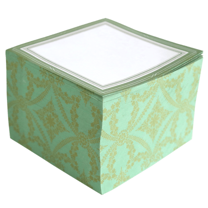 a green and gold box with a white lid.