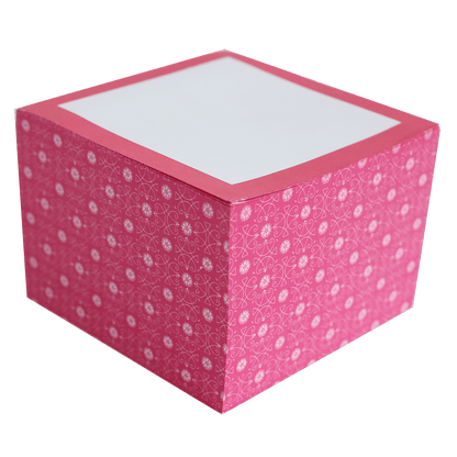 a pink box with white dots on it.