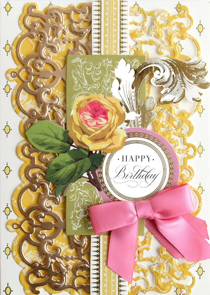 a close up of a card with a flower.