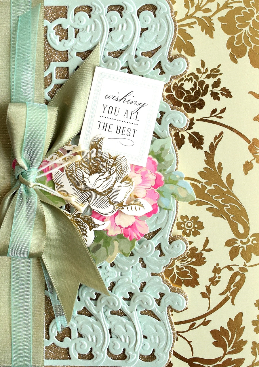 a close up of a card with a bow on it.