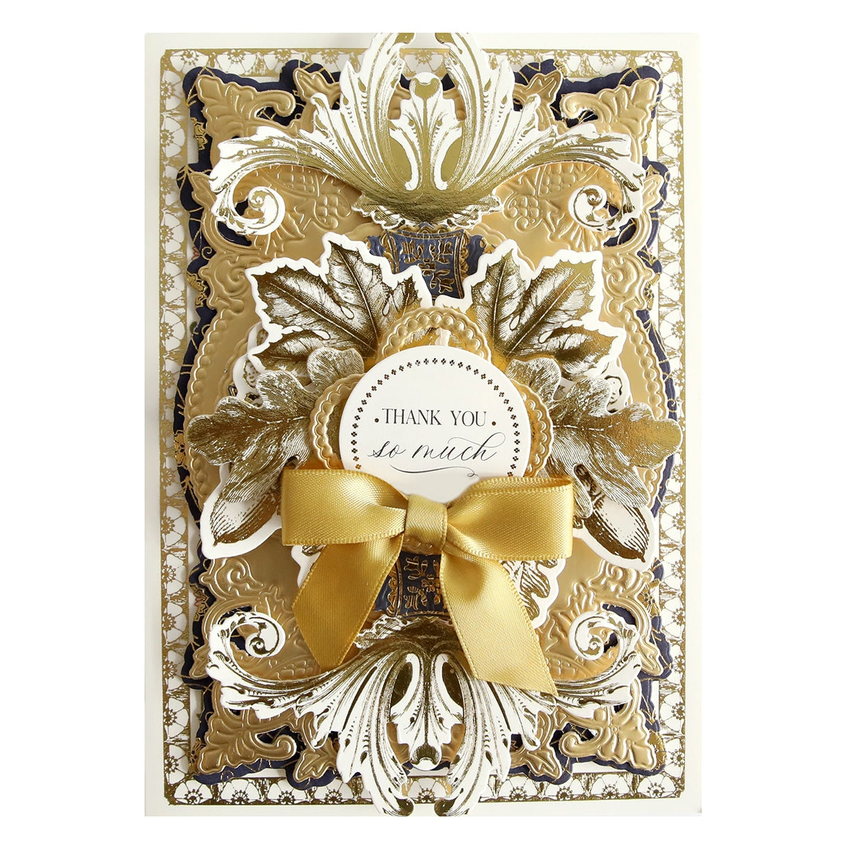 a thank you card with a gold bow.