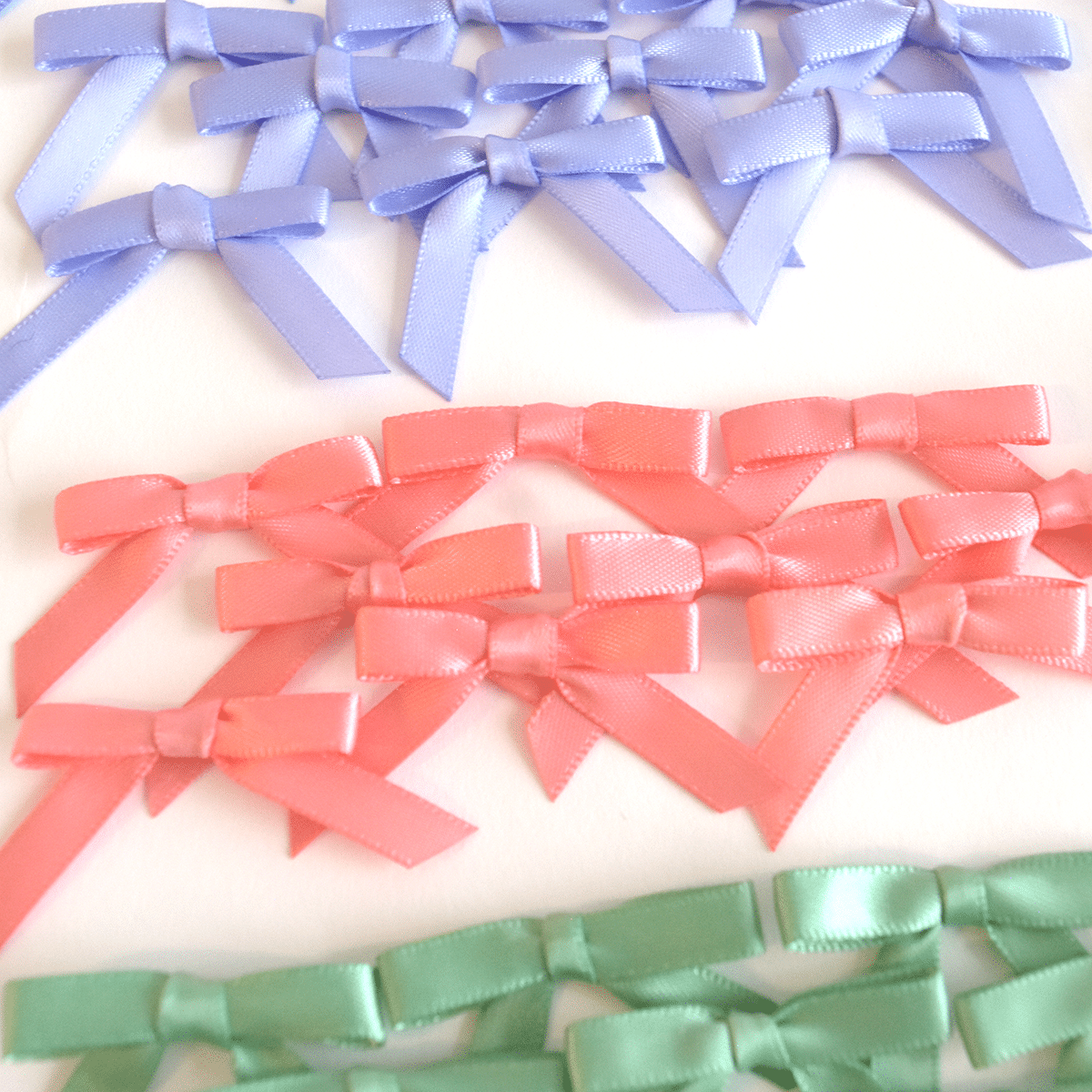 a close up of a bunch of bows on a table.