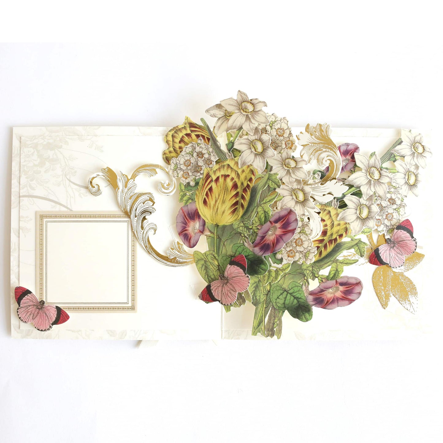 a picture frame decorated with flowers and butterflies.