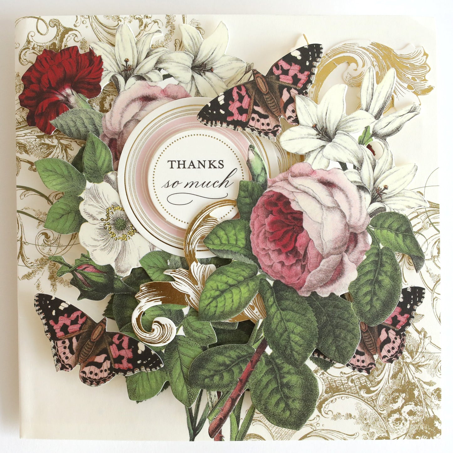 a thank card with flowers and butterflies on it.