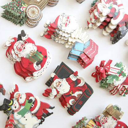 A collection of Retro Santa Sticker Bundle decorations on a white surface.