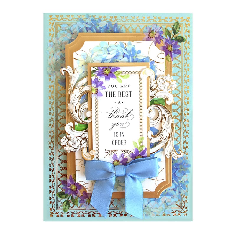 a card with a blue ribbon and a blue bow.