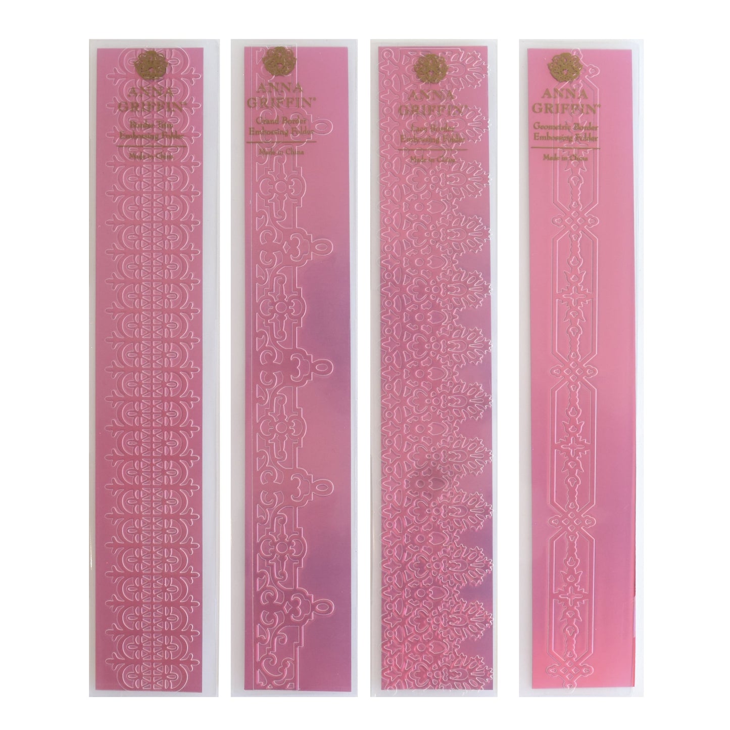 a set of three pink bookmarks with gold lettering.