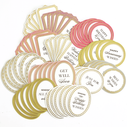 a bunch of tags that are sitting on a table.