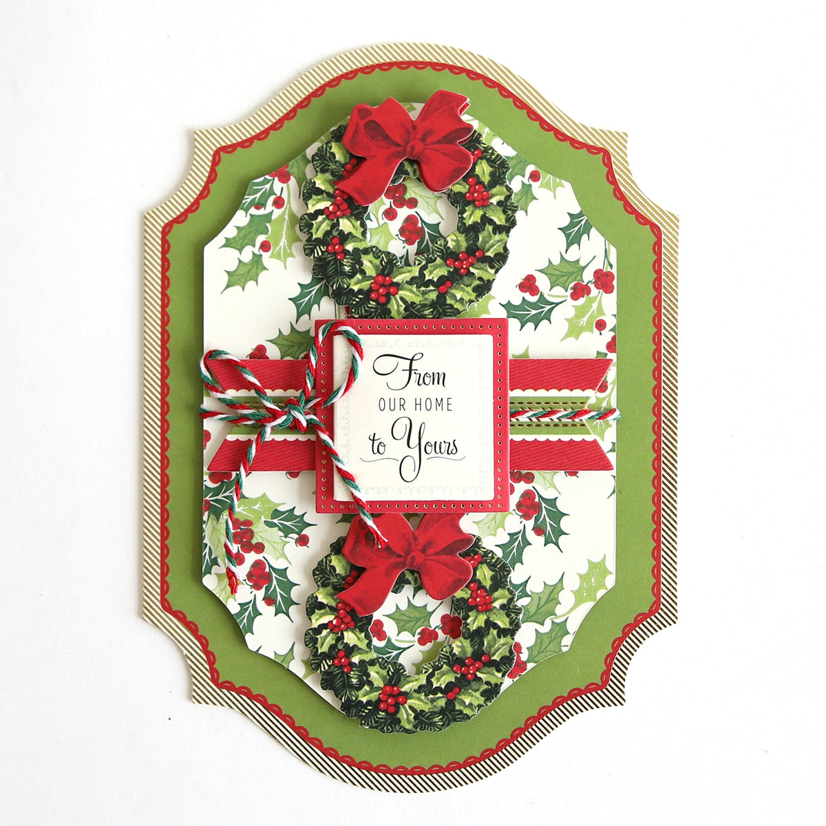 a card with a christmas wreath on it.