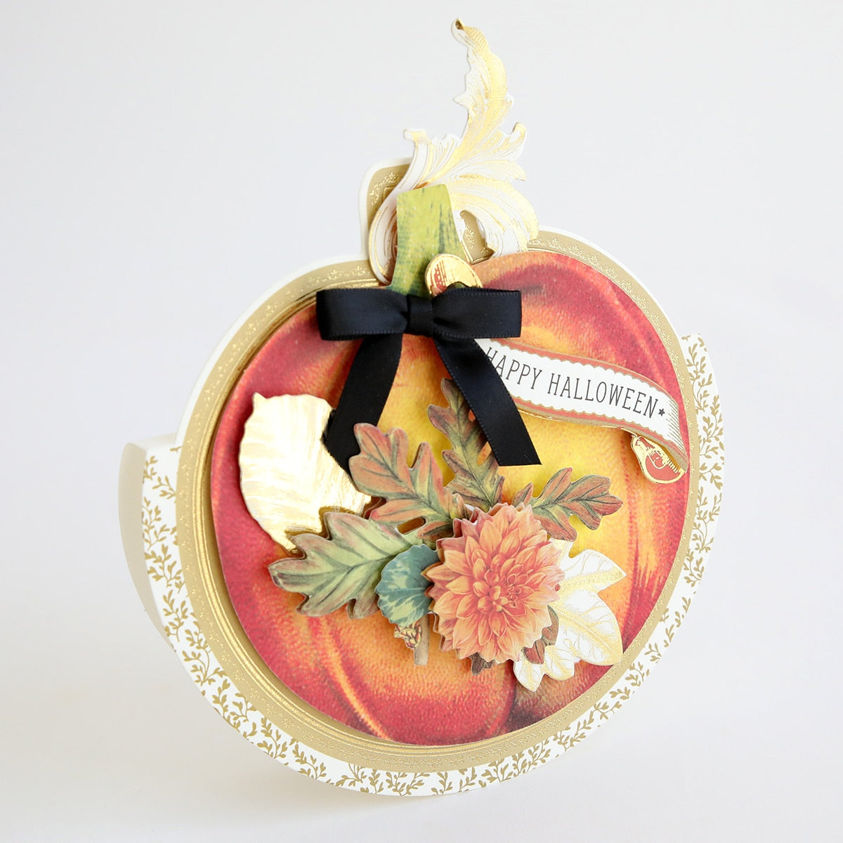 The Simply Rocking Pumpkin Card Making Kit with a pumpkin and flowers on it.