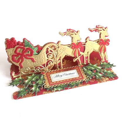 a christmas card with a horse drawn sleigh.