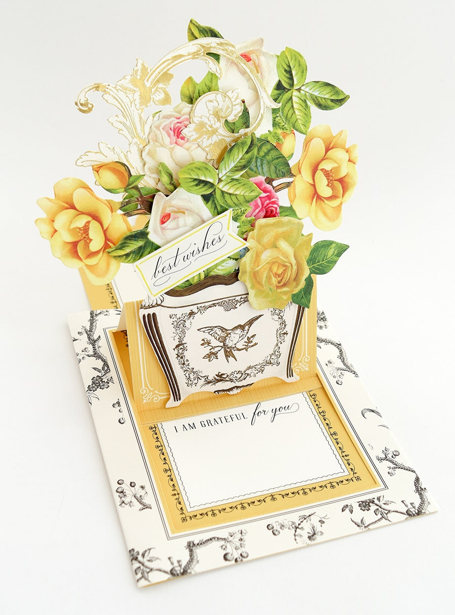 a close up of a card with flowers on it.