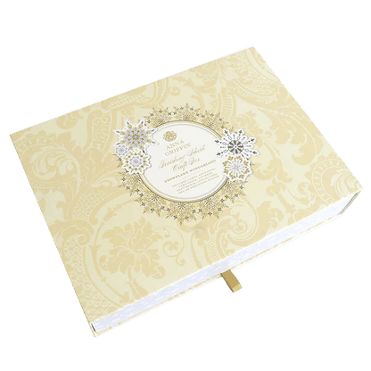 a wedding album with a gold and white design.