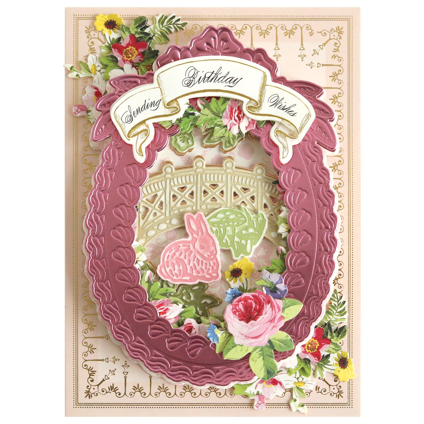 a greeting card with a pink and green wreath.