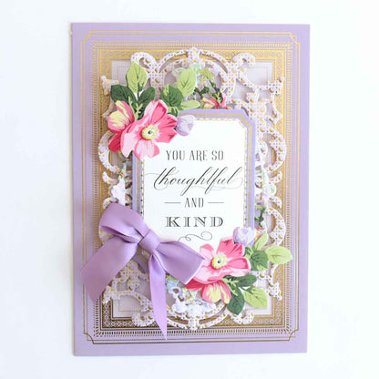 a card with a purple ribbon and a card saying you are so beautiful and kind.