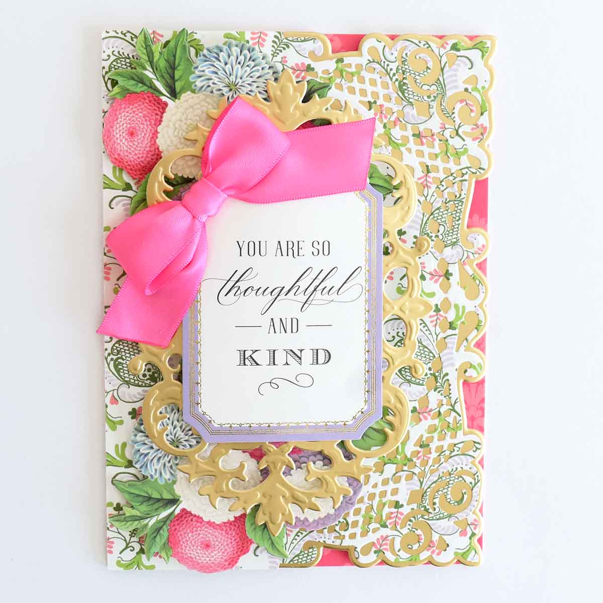 a card with a pink bow and a card saying you are so beautiful and kind.