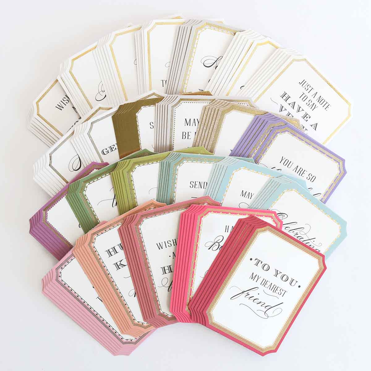 a bunch of cards that are sitting on a table.