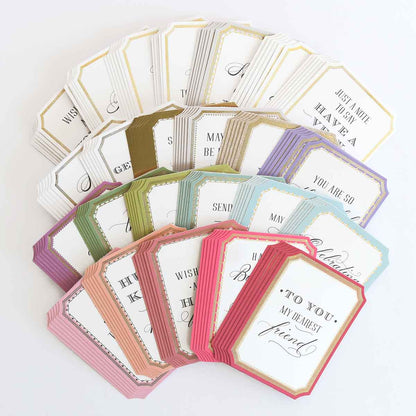 a bunch of cards that are sitting on a table.