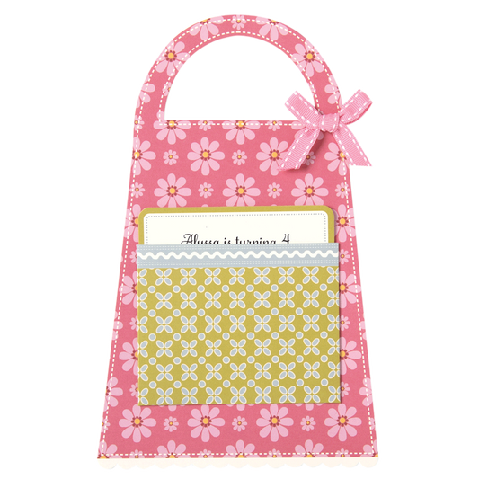 a pink bag with flowers and a name tag.