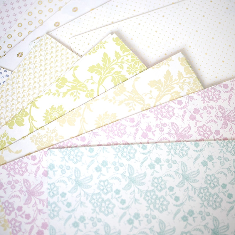 a close up of many different colored papers.