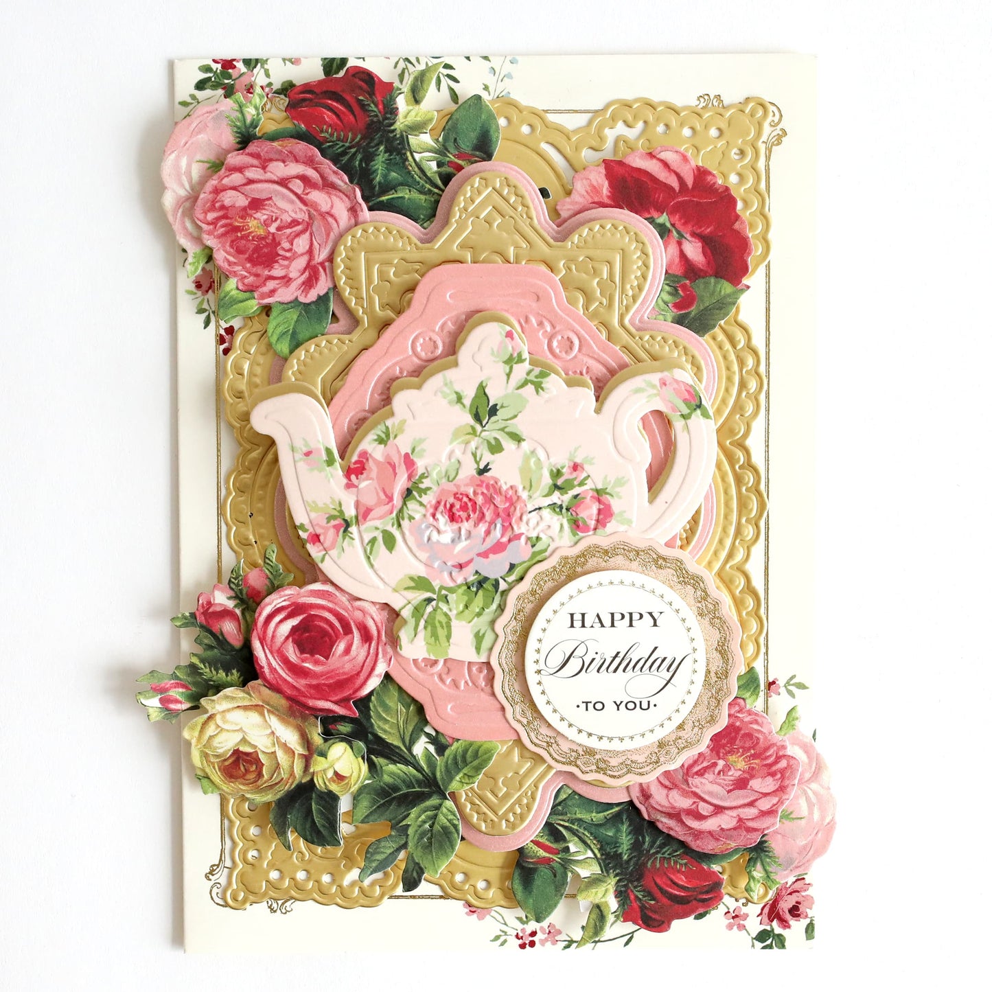 a birthday card with roses and a teapot.