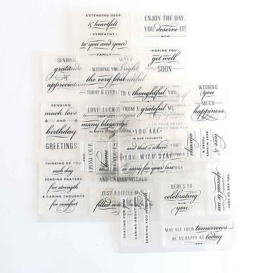 a bunch of stamps that are on top of a table.