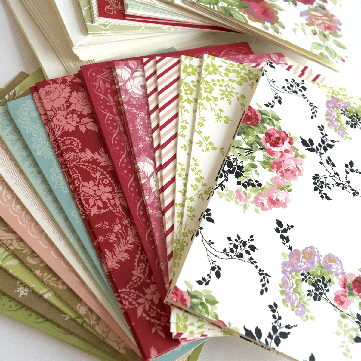 a bunch of papers that are on a table.