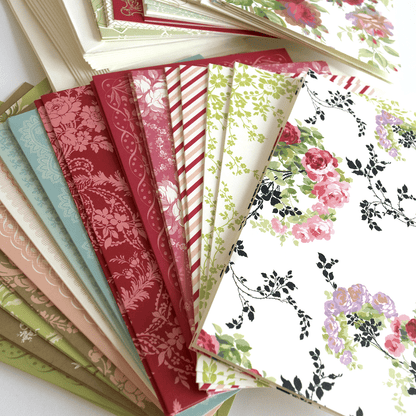 a bunch of papers that are on a table.