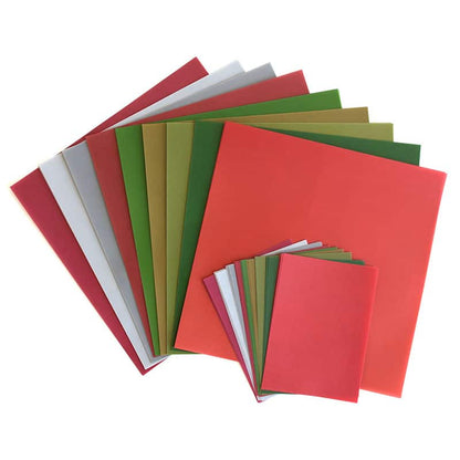 a bunch of different colors of paper on a white background.