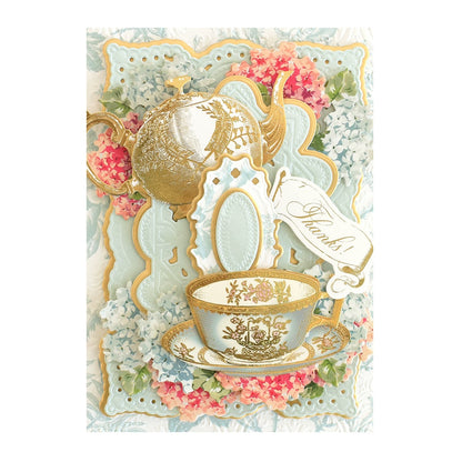 a greeting card with a teacup and a teapot.