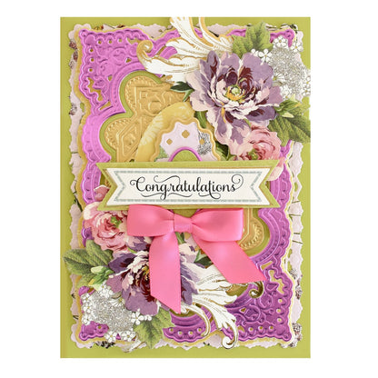 a congratulations card with a pink bow and flowers.