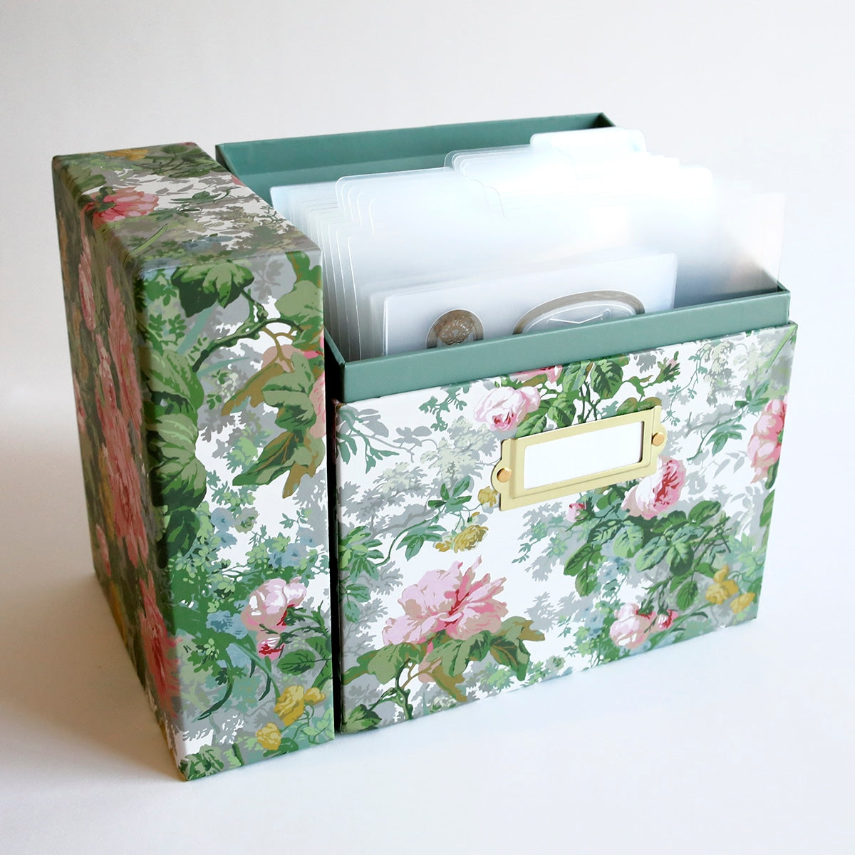 a flowered box with a card holder in it.