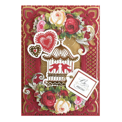 a card with a birdcage and flowers on it.