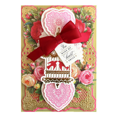 a close up of a card with a bow on it.