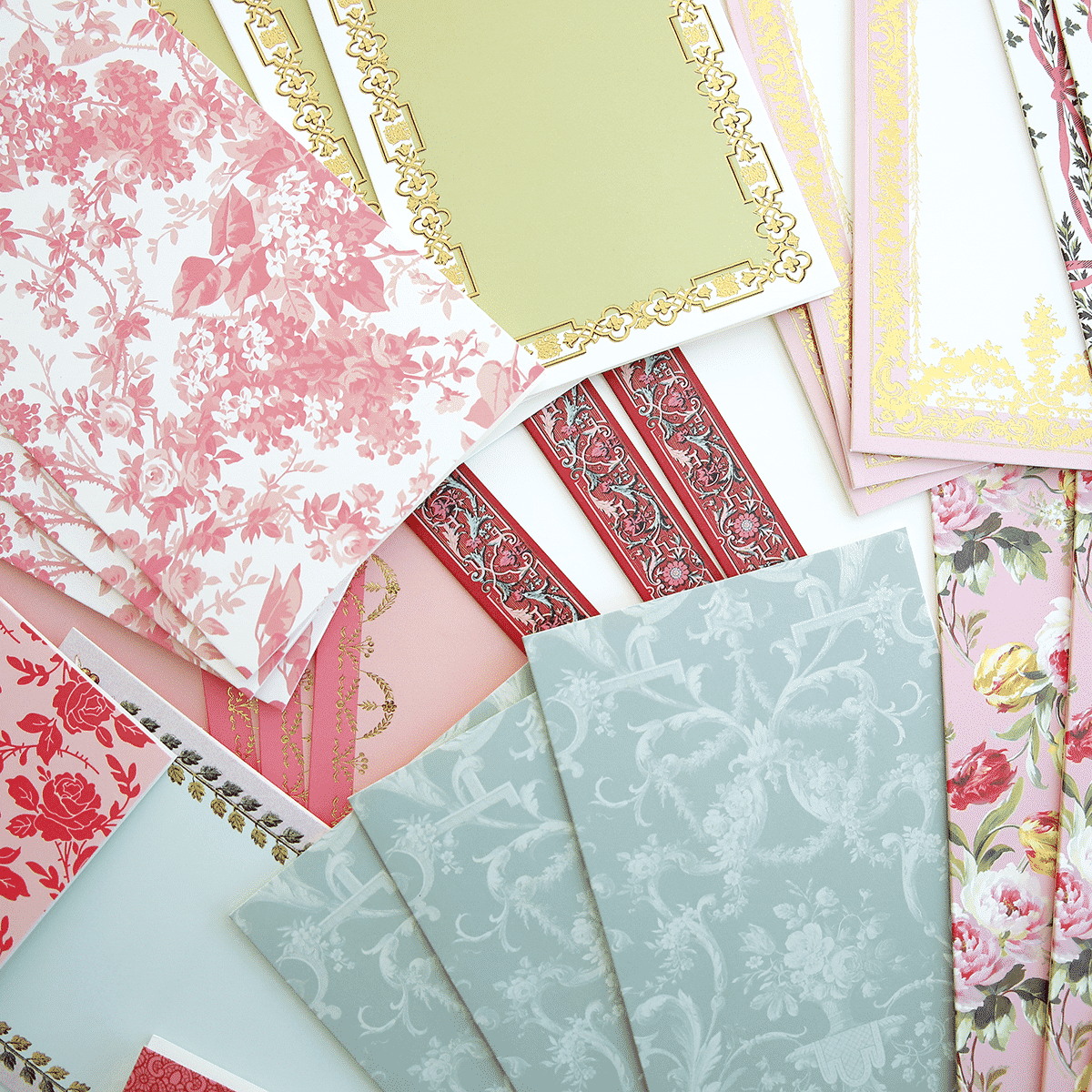 a bunch of different types of paper on a table.