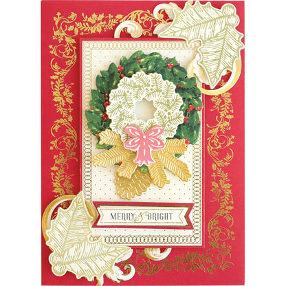a christmas card with a wreath on it.