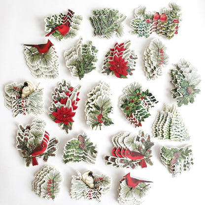 a bunch of christmas decorations on a white surface.
