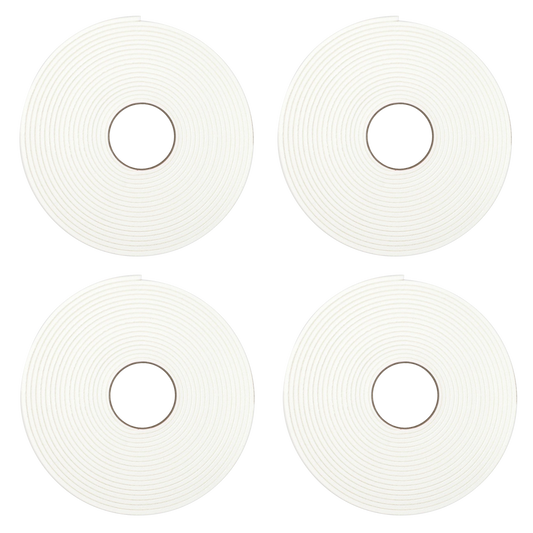 four rolls of white paper with silver circles.