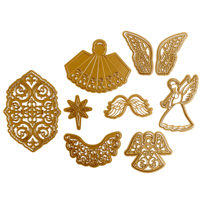 a set of gold angel cutouts on a green background.