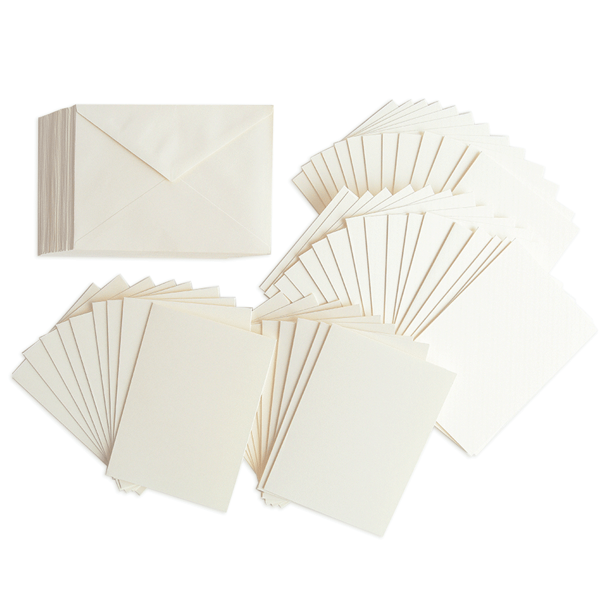 a bunch of white cards and envelopes on a green background.
